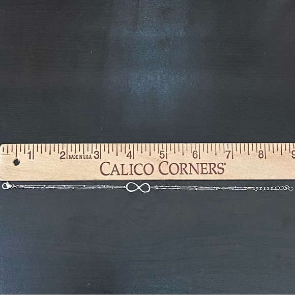 Silver-tone Dainty Infinity Bracelet - Picture 8 of 9